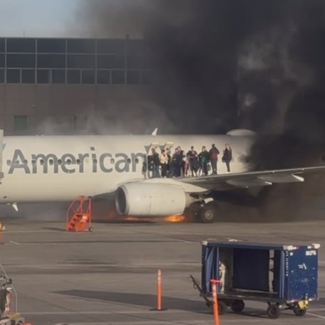 Plane Abandonment Drama: Passengers Flee to Wing as Engine Erupts in Flames at Denver Airport